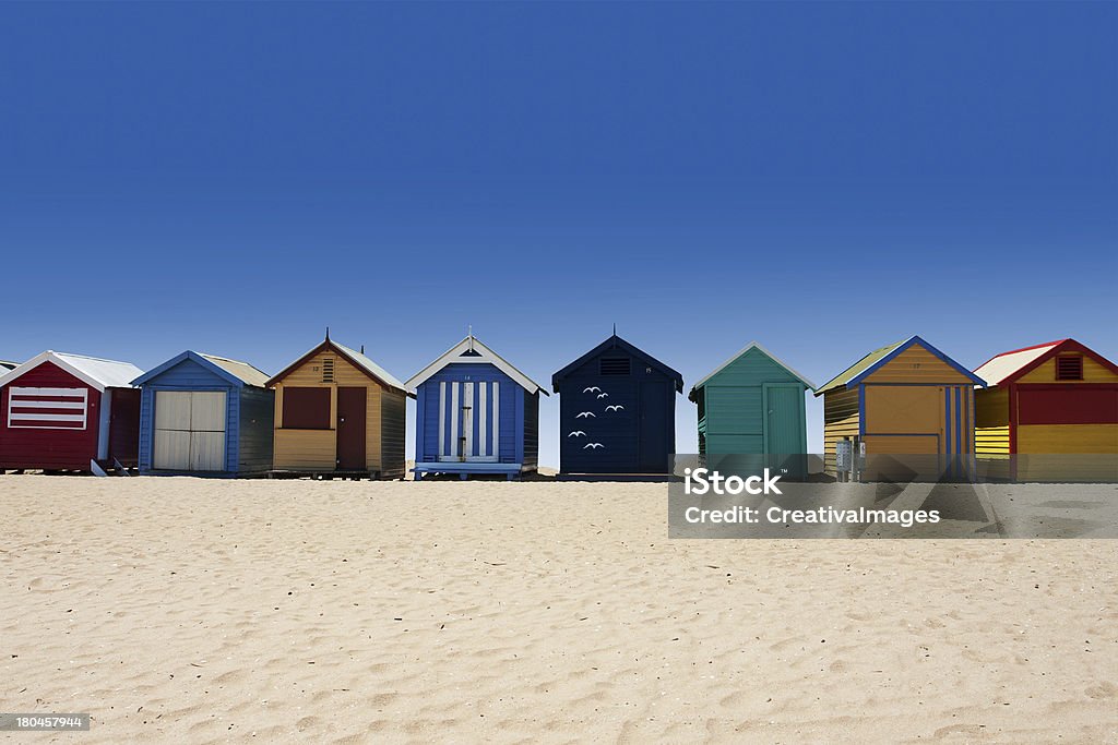 Australia tour to Brighton Beach bathing boxes Beautiful Brighton Beach with colorful houses in Melbourne, Australia Brighton Beach - Melbourne Stock Photo