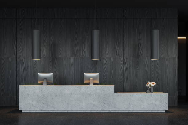 istock Black modern office interior stone desk with pc computer and decoration 1804586913