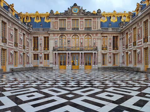 Exterior of the Palace of Versailles before the crowds arrive.