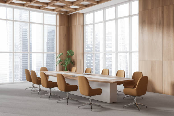istock Cozy stylish conference room interior with table and chairs, panoramic window 1804590211