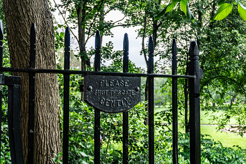 Merrion Square Park, Dublin, Ireland. One of the entrance gates reminds us to shut the gate gently. The Park dates back to the 1700s.
