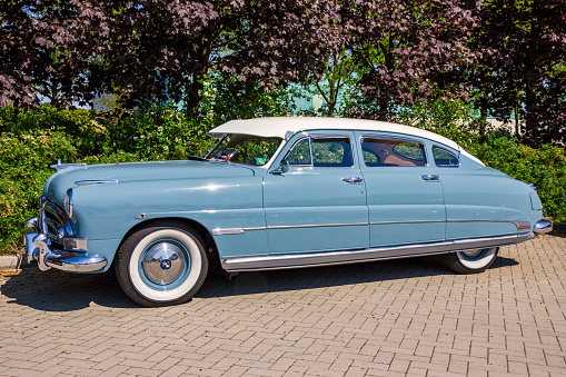 1951 Hudson Commodore 6 classic car on the parking lot. Rosmalen, The Netherlands - May 8, 2016