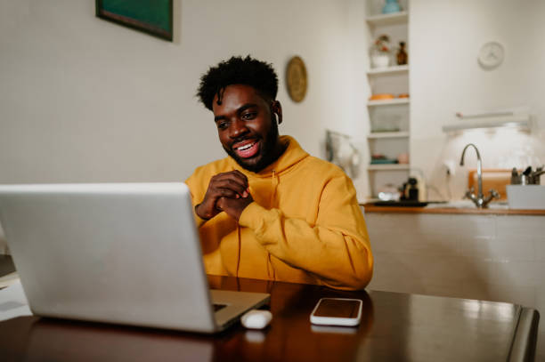 istock A friendly freelancer is sitting at home and having a conference call with a client from home. 1804601866