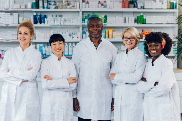 istock Portrait of five multicultural pharmacists in pharmacy. 1804601898