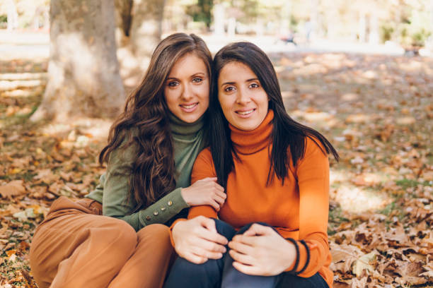 istock Two young woman enjoying autumn 1804604342