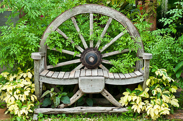 istock Wooden chair made from wagon wheel. 180461099