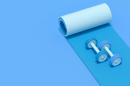 Barbells on exercise mat on blue background. Digitally generate image.
