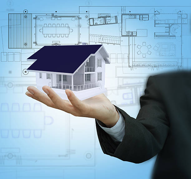 istock Businessman present house model and plan on touch screen 180462639
