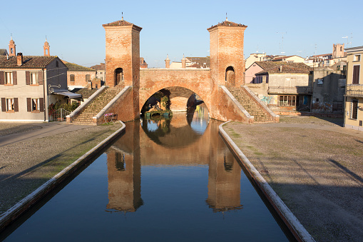 Comacchio, Italy - December 30, 2019: view of trepponti bridge in Comacchio