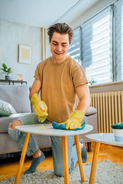 istock Man cleaning his apartment 1804664444