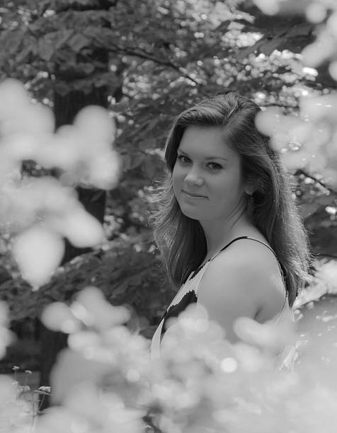 istock young female model outside in a park 180467468