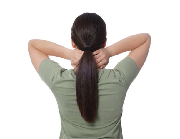 istock Woman suffering from pain in neck on white background, back view. Arthritis symptom 1804687247