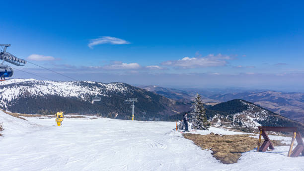istock Panoramic view from the mountain top during winter season. 1804707245