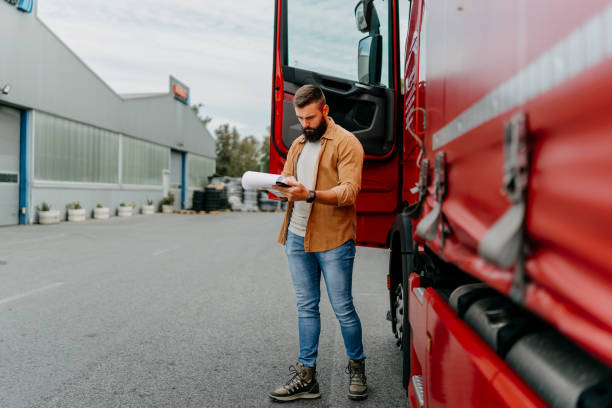 istock Truck driver records on clipboard 1804726886