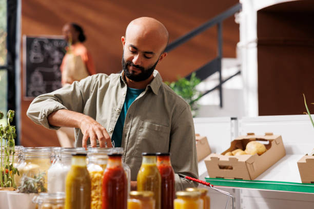 istock Male consumer selecting organic products 1804727935