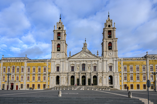 Mafra, Portugal - Nov 11, 2023: The Mafra National Palace, also known as the Palace of Mafra (Palácio Nacional de Mafra), is a monumental Baroque palace and convent complex located in Mafra, Portugal.