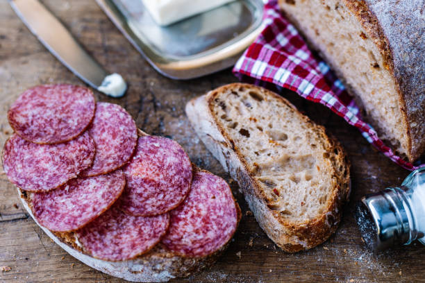istock Sliced salami sandwich on rye homemade bread. 1804756152