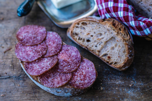 istock Sliced salami sandwich on rye homemade bread. 1804756163