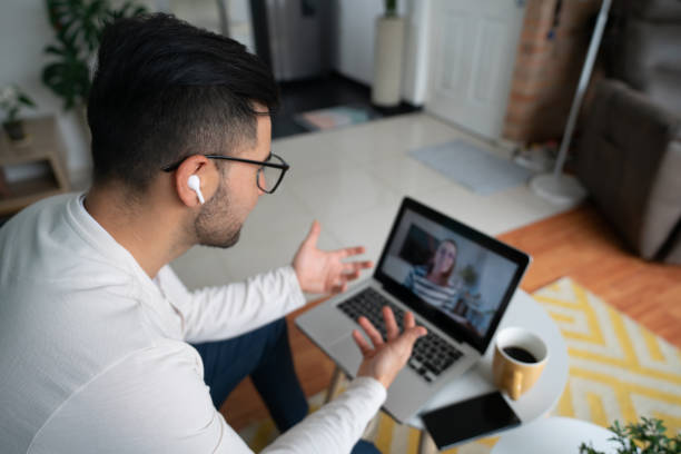 istock Man at home talking a video call 1804787808