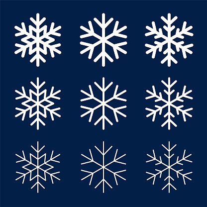 Set of white snowflakes. Vector icon set.