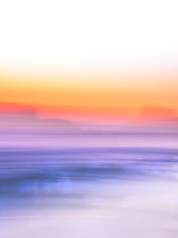 istock Romantic foggy motion blur sunset or sunrise landscape for soft warm-toned pastel backgrounds 1804805474