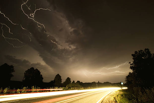 Lightnings over the road stock photo