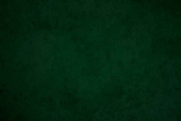 istock Green chalkboard texture for school display backdrop. chalk traces erased with copy space for add text or graphic design grunge background. Green board. Dark green wall backdrop. Education concepts. 1804852988