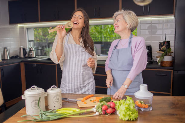 istock Volunteer is helping an elderly woman 1804853803