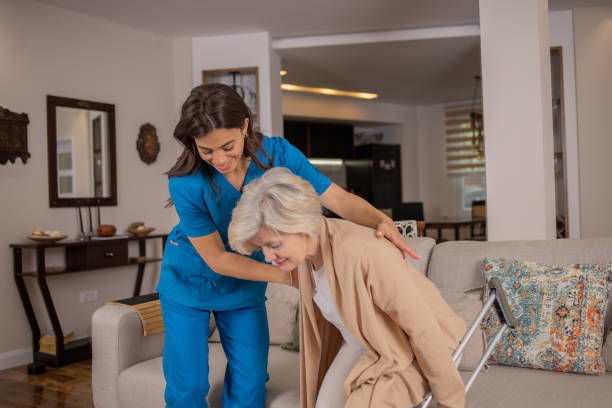 istock Nurse helping senior woman 1804856829