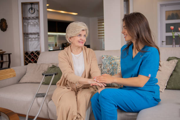istock Retired woman with female home carer 1804856830