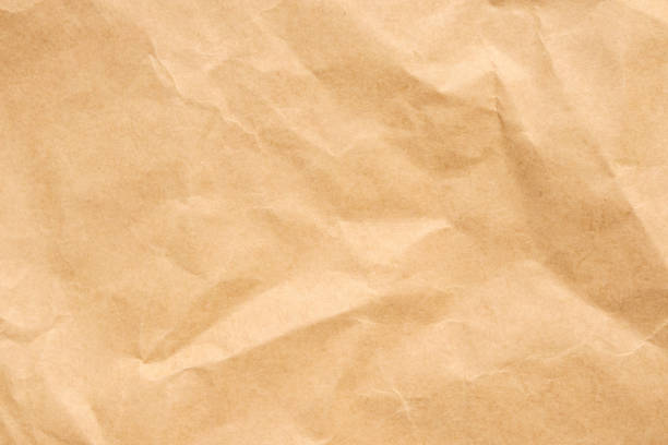 istock Abstract crumpled and creased recycle brown paper texture background 1804862175