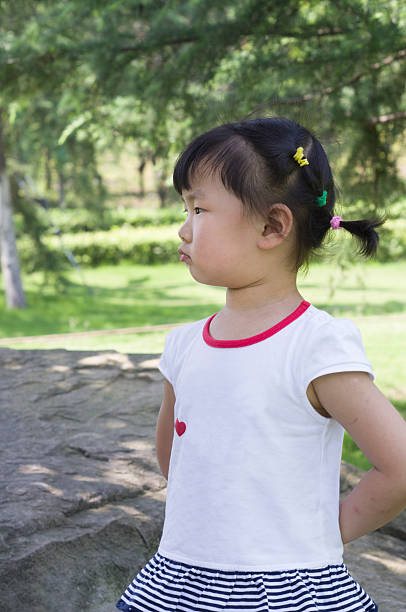 istock angry little girl 180486747