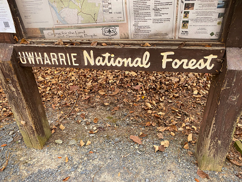 New London, North Carolina - October 26, 2023: Uwharrie National Forest sign on information board near New London, North Carolina.