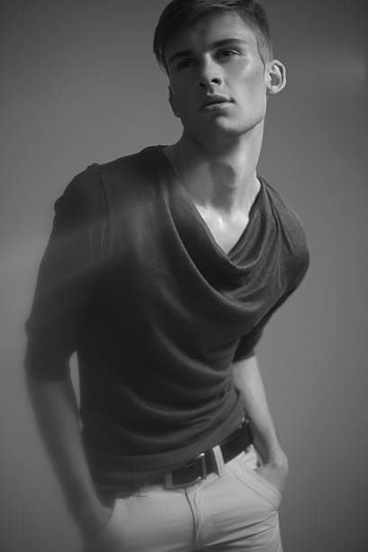 istock Handsome man looking up. Black and white photo 180491387