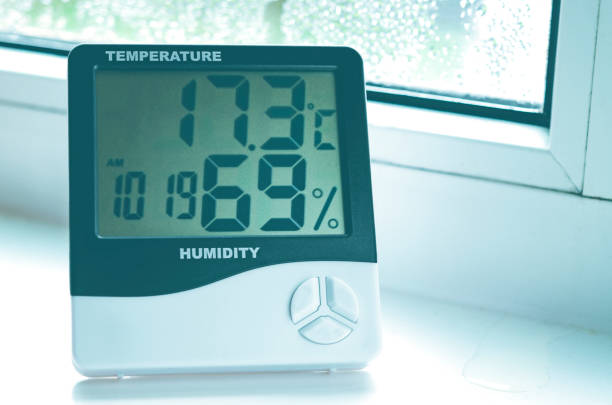 istock A hygrometer with a thermometer stands on the windowsill with condensation. 1804917390