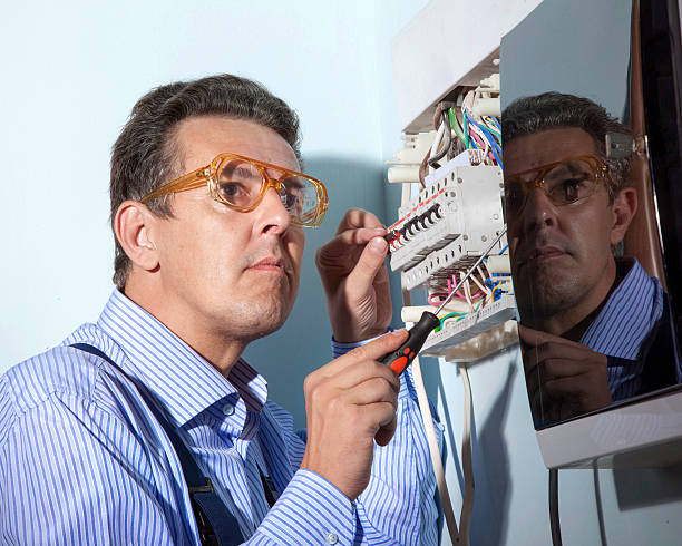 electrician at work electrician works with wires cable tester stock pictures, royalty-free photos & images