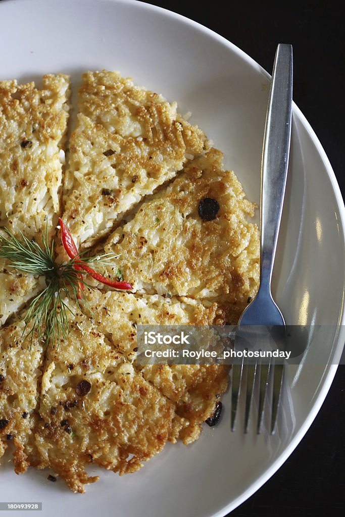 “khai phra athit” (the sun’s egg) the most favourite dish of King Rama IX of Thailand was his own culinary creation called “khai phra athit” (the sun’s egg). It was an omelette garnished with grains of crispy-brown cooked rice  resembling dark spots on the sun Breakfast Stock Photo
