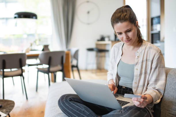 istock A woman paying bills online 1804947118