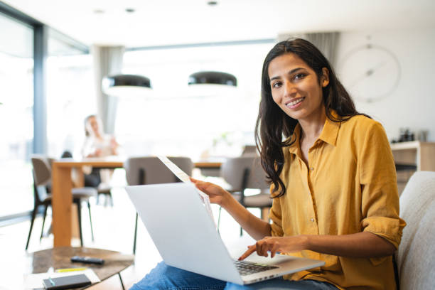 istock A woman paying bills online 1804947122