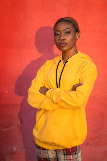 istock Woman wearing yellow sweatshirt 1804949457