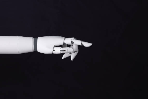 istock Robot hand finger making contact or pressing something on dark isolated background. Cyborg mechanical arm pointing. artificial Intelligence futuristic design concept 1804990154