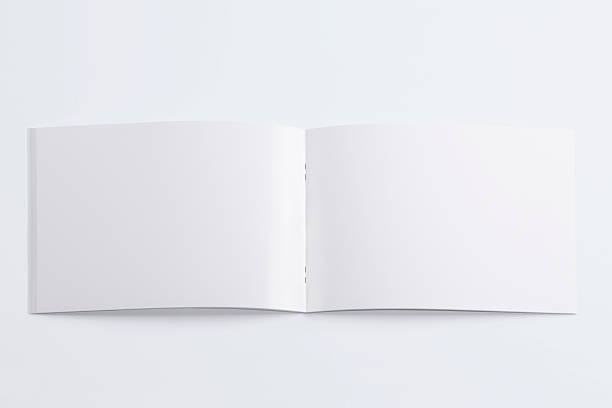 istock Blank opened magazine isolated on white 180506753