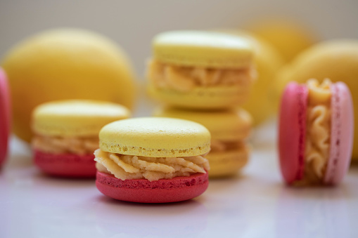 Stack of sweet yellow and red macaroons