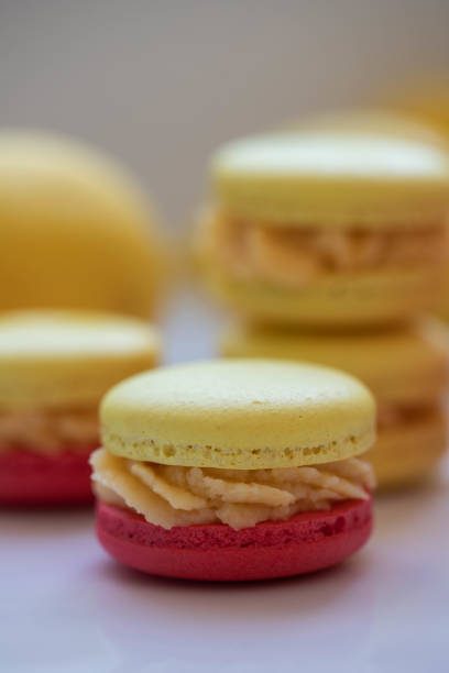 istock Stack of sweet yellow and red macaroons 1805087314