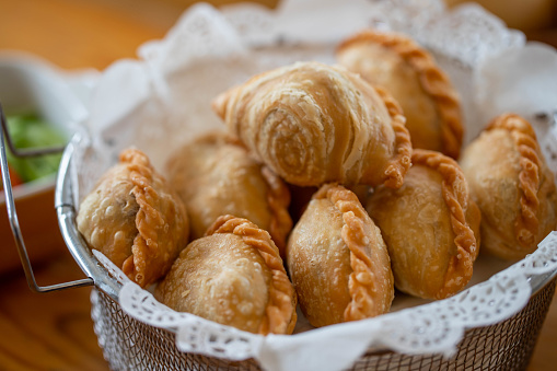 Curry puffs on a steel basket