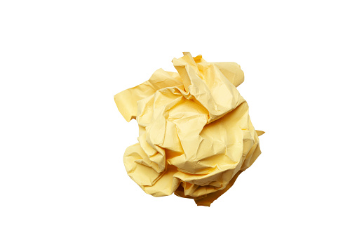 Yellow crumpled paper on a white background
