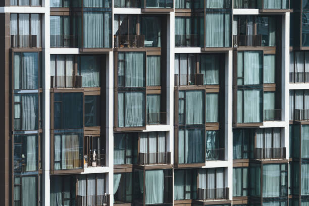istock Window building apartment. Modern city skyscraper in day light. Ornamented. 1805120401