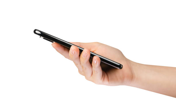 istock Clipping path, Hand holding the black smartphone on isolated white background. 1805173536