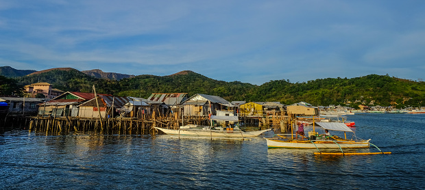 Palawan, Philippines - Apr 6, 2017. Fishing village with small pier in El Nido Island, Palawan, Philippines.