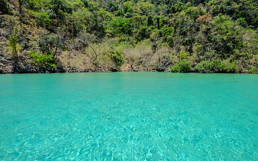 Turquoise water on sea at summer in Coron Island, Philippines.